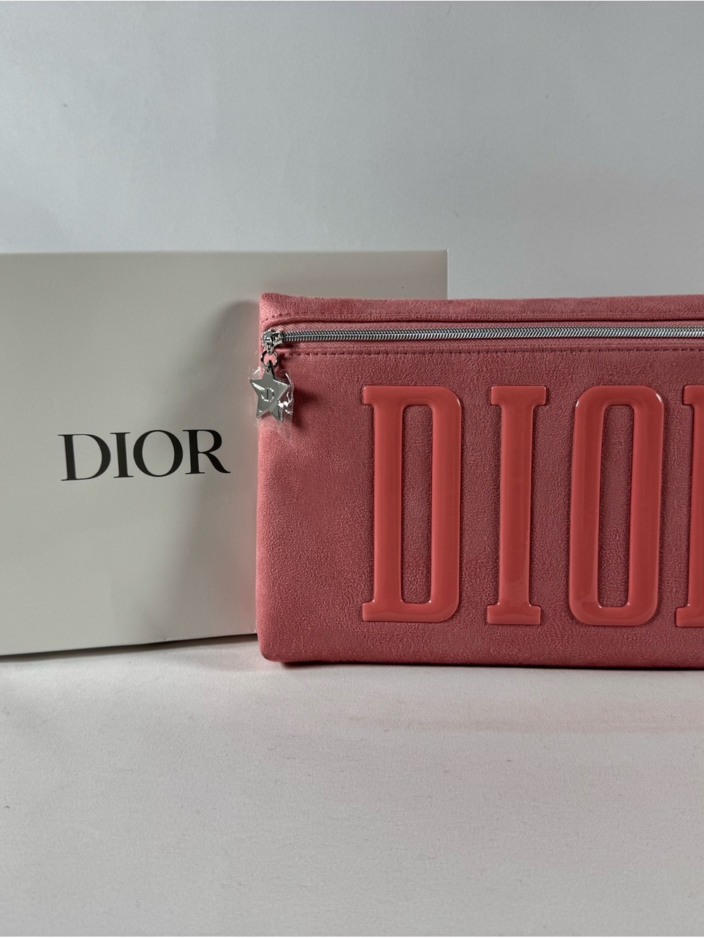 Dior Pink Embossed Logo Wristlet with Silver Star Charm